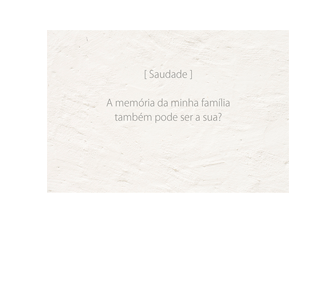 Imagem horizontal de uma parede branca com a décima e última frase, em três linhas: [ Saudade ] / A memória da minha família / também pode ser a sua?